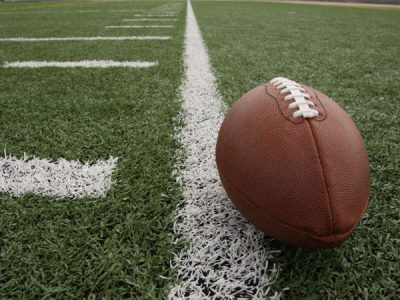 A football sitting on the field